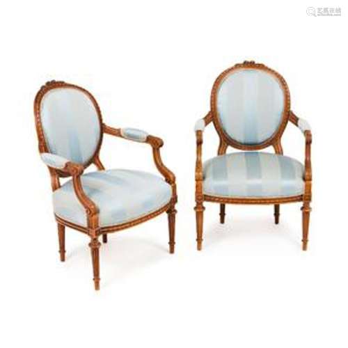 A Louis XVI style pair of fauteuils