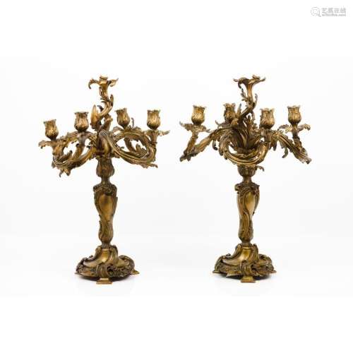 A pair of Louis XV four branch candelabra