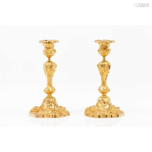 A pair of Louis XV style candlesticks