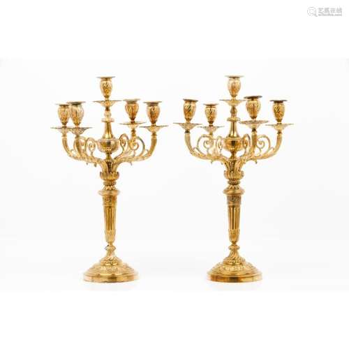 A pair of Louis XVI style five branch candelabra