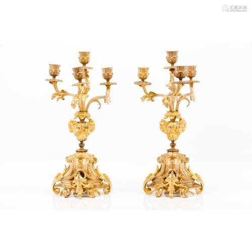 A pair of Louis XV style four branch candelabra