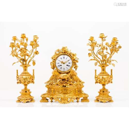 A Napoleon III garniture comprising of a clock and pair of f...