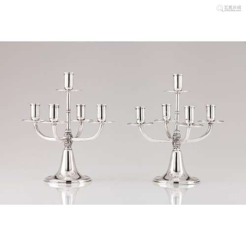 A pair of Art Deco five branch candelabra