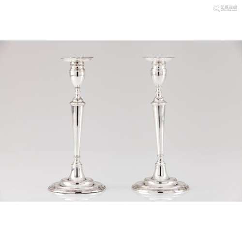 A pair of D. Maria candle stands