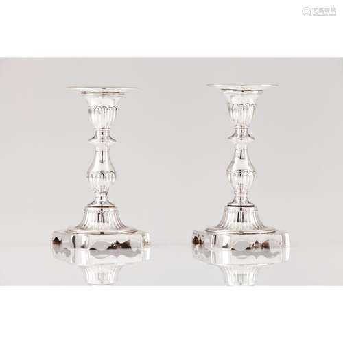 A pair of small candlesticks