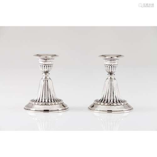 A pair of D.Maria style dressing table candlesticks