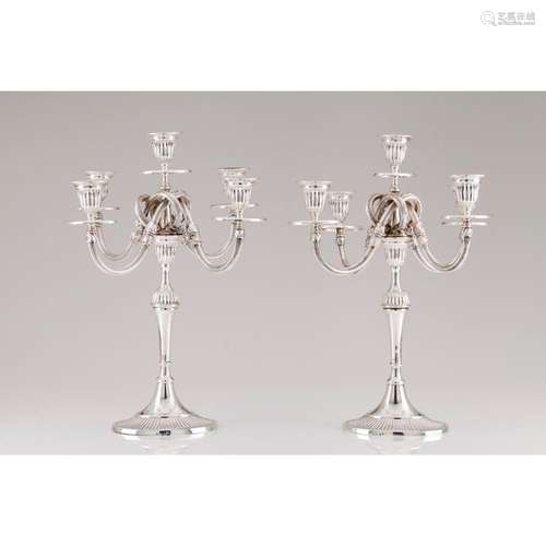 A pair of five branch candelabra