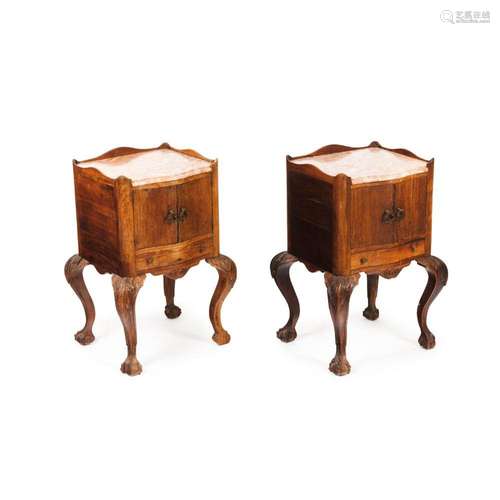 A pair of bedside cabinets