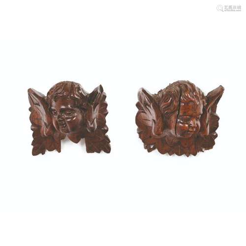 A pair of cherubs heads