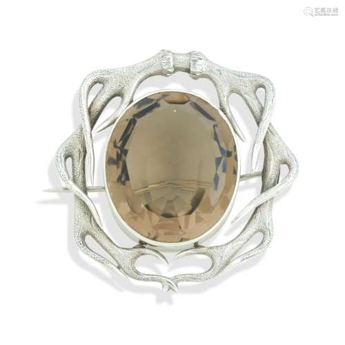A SILVER AND CITRINE BROOCH, IN THE MANNER OF MACKAY OF ELGI...