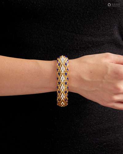 AN 18K GOLD AND ENAMEL BRACELET