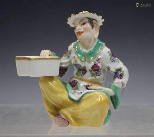 A Meissen porcelain figure of a Chinese man, ear