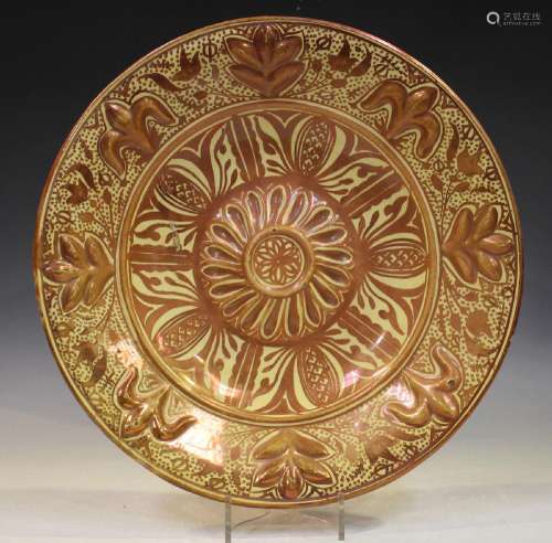 An Hispano Moresque copper lustre charger, late