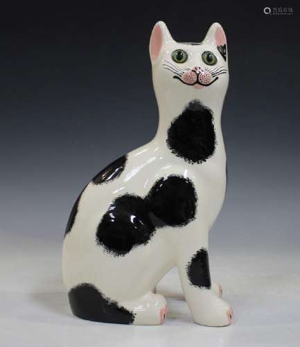 A large Griselda Hill Pottery Wemyss style cat,