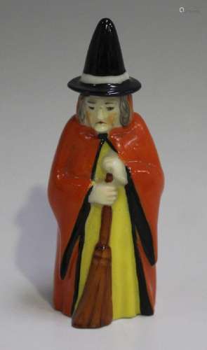 A Royal Worcester Witch candle snuffer, circa 19