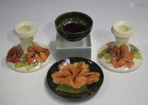 A pair of Moorcroft Hibiscus pattern stub candle
