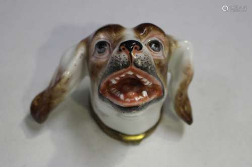 A Continental porcelain dog head bonbonnière, 19