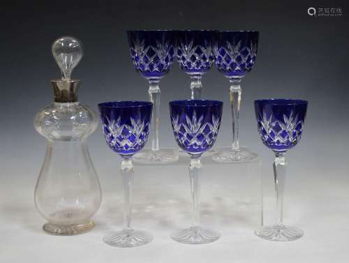 A set of six blue flashed and cut wine glasses,