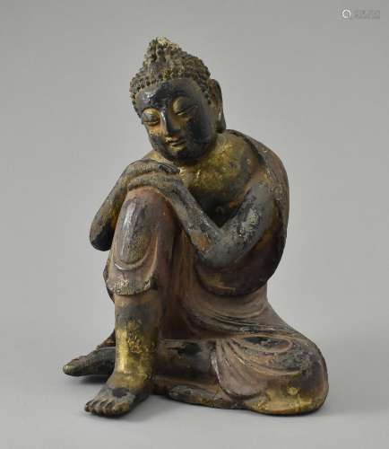 Sitzender Buddhaschueler.