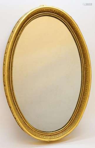 Miroir ovale doré à la feuille de vigne - Hauteur 91 cm. - L...