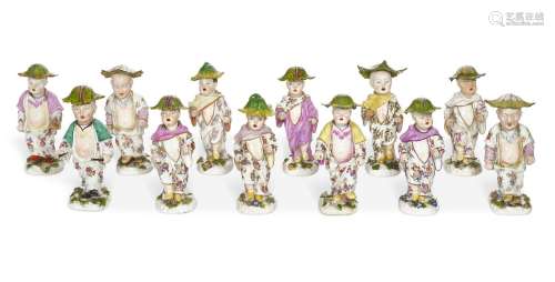 TWELVE MEISSEN PORCELAIN FIGURES OF BOYS, SIX WITH NODDING H...