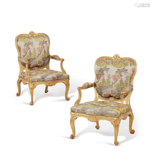 A PAIR OF GEORGE III GILTWOOD ARMCHAIRS