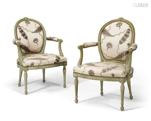 A PAIR OF GEORGE III GREEN AND WHITE-PAINTED ARMCHAIRS