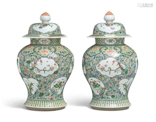 A PAIR OF CHINESE FAMILLE VERTE JARS AND COVERS