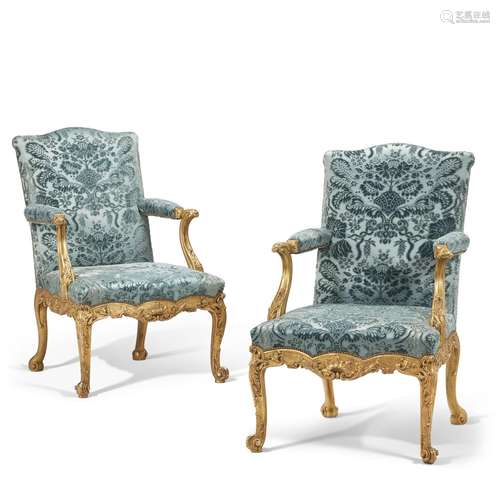 A PAIR OF GEORGE III GILTWOOD ARMCHAIRS