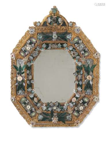 A NORTH ITALIAN GILT-METAL AND COLORED GLASS MIRROR