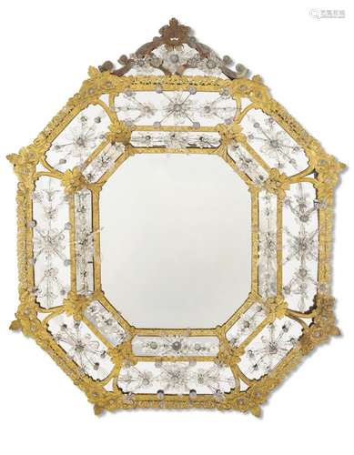 A NORTH ITALIAN GILT-METAL AND CUT-GLASS MIRROR