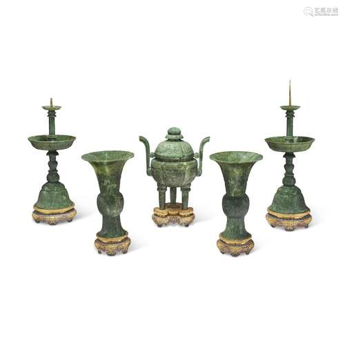 A CHINESE SPINACH-GREEN JADE FIVE-PIECE ALTAR GARNITURE WITH...