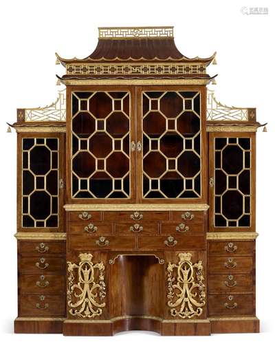 A GEORGE II MAHOGANY AND PARCEL-GILT BREAKFRONT SECRETAIRE B...