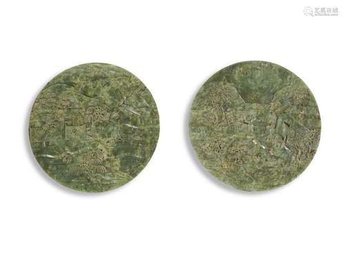 A PAIR OF CHINESE SPINACH-GREEN JADE CIRCULAR PLAQUES