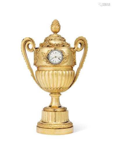 A GEORGE III ORMOLU, SILVER AND PASTE-SET VASE TIMEPIECE TAB...