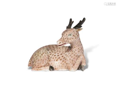 A CHINESE EXPORT PORCELAIN MODEL OF A RECUMBENT STAG