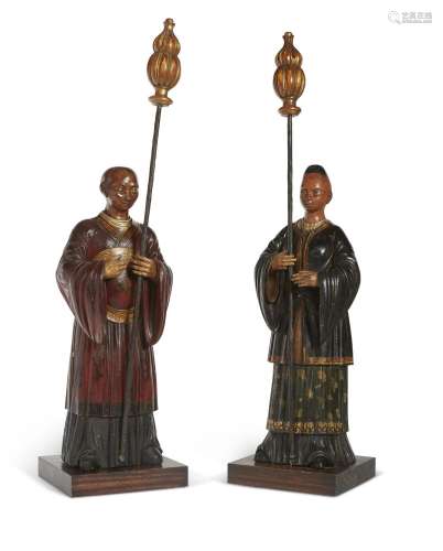 A PAIR OF NORTH EUROPEAN POLYCHROME-DECORATED FIGURES