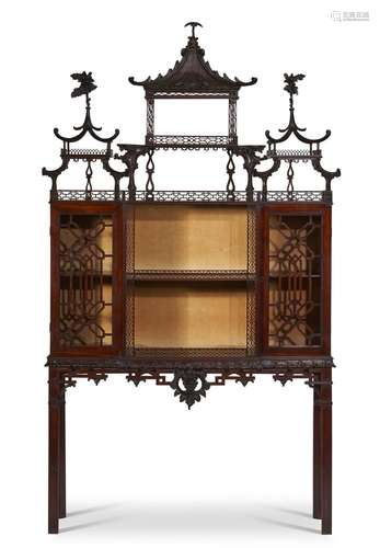 AN EARLY GEORGE III MAHOGANY 'CHINA' CABINET-ON-STAN...