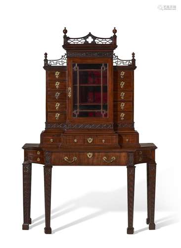 A GEORGE III MAHOGANY SECRETAIRE CABINET-ON-STAND, AFTER A D...