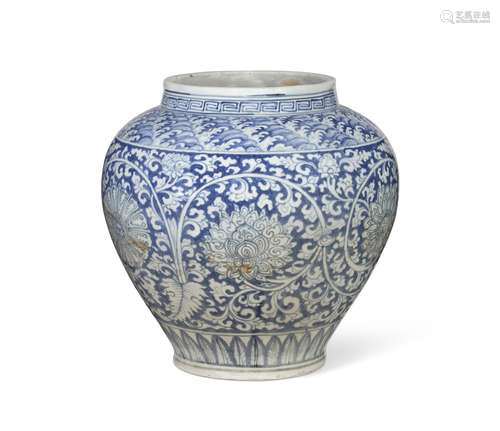 A RARE CHINESE REVERSE-DECORATED BLUE AND WHITE JAR