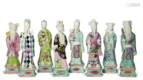 A GROUP OF EIGHT CHINESE EXPORT PORCELAIN FAMILLE ROSE FIGUR...
