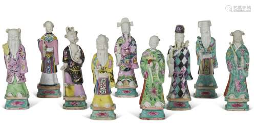A GROUP OF NINE CHINESE EXPORT PORCELAIN FAMILLE ROSE FIGURE...