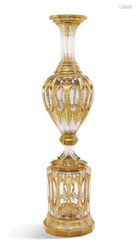 A LARGE BOHEMIAN GILT-DECORATED CLEAR GLASS VASE ON STAND