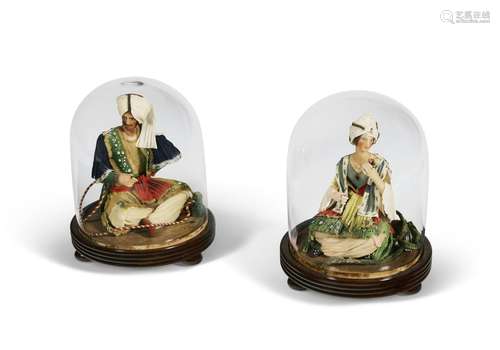 A PAIR OF EARLY VICTORIAN TINTED-WAX 'TURKISH' FIGUR...