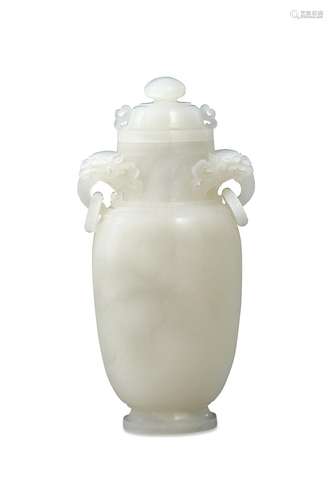 A CHINESE WHITE JADE VASE AND COVER