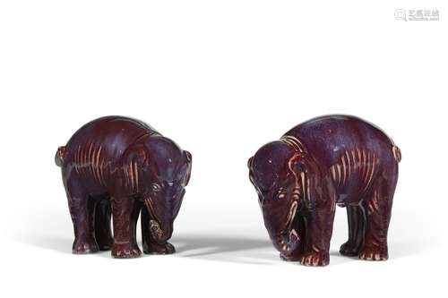 A PAIR OF CHINESE PORCELAIN FLAMBE-GLAZED ELEPHANTS