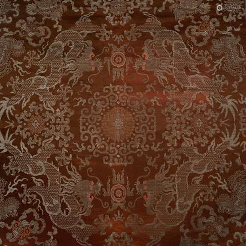 A PANEL OF CHINESE COPPER TONED SILK SATIN AND METALLIC BROC...