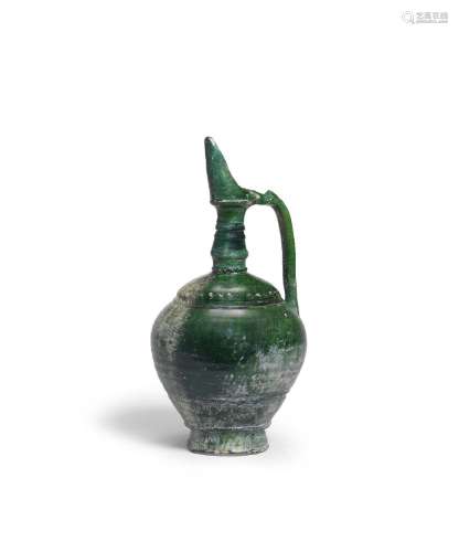 An Umayyad monochrome pottery ewer Syria or Mesopotamia, 8th...