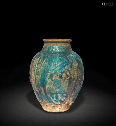 A rare early Raqqa moulded lustre pottery Jar Fatimid Syria,...
