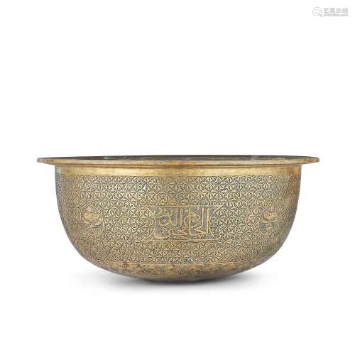 A large Mamluk engraved brass basin Egypt or Syria, late 15t...